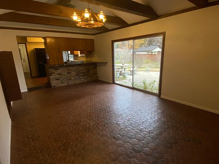 Large den looking into kitchen