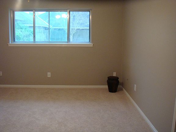 Spacious Master Bedroom with fresh tasteful paint color