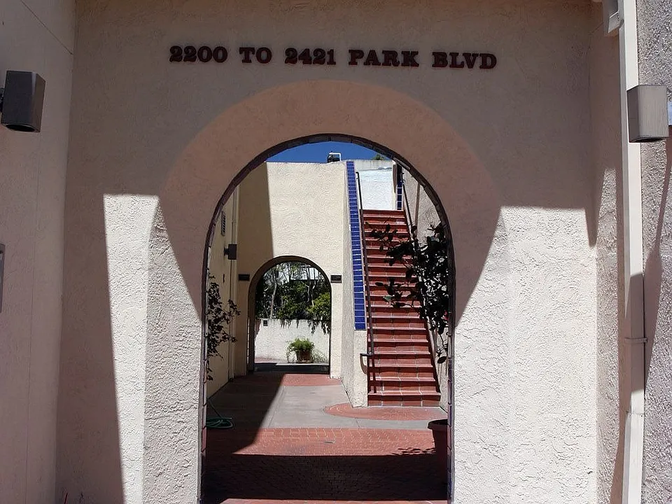 Spanish style arch entrance from the street