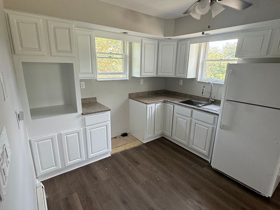 Kitchen, granite counter and new oven being installed