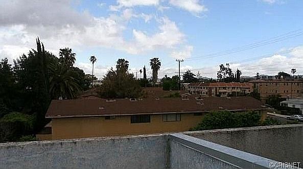 2nd image of 14727 Magnolia Blvd Unit 115
