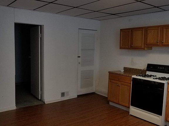 Kitchen closet for additional storage. Door from kitchen to laundry room.