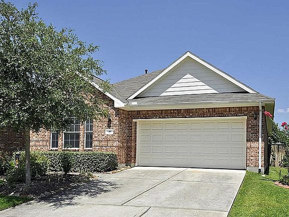 Garage floor has poxy paint, built-in shelves & wall cabinets, floored attic above garage, Vice & Gr