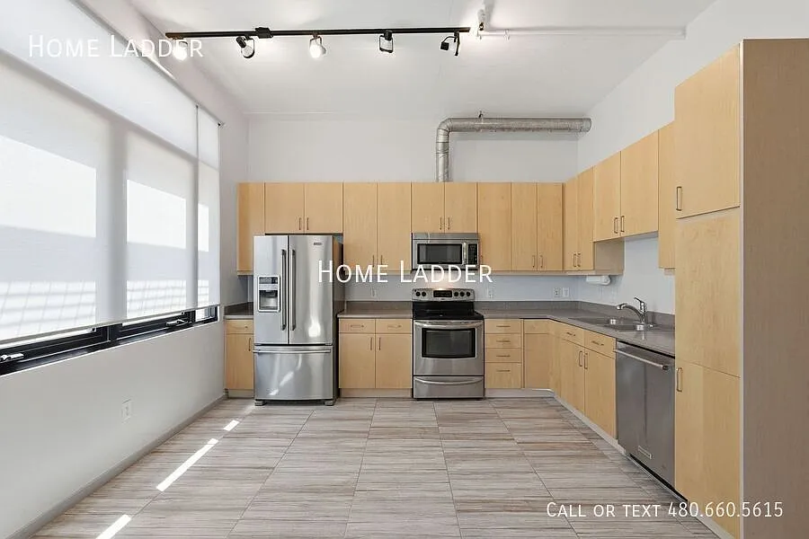 $1,000 Off First Months Rent! Move-In Ready Condo at Third Avenue Lofts | Garage Parking, Pool & ... — Photo 2