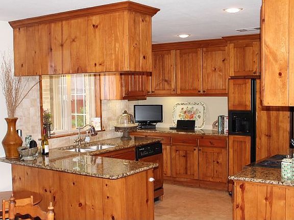 Custom Cabinetry and Granite Countertops.