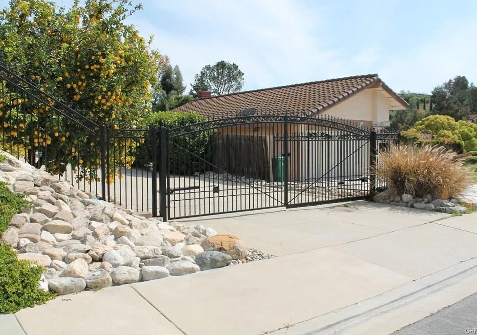 This incredible 4 bedroom single level home with private GATE entry — Photo 2