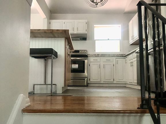View from the front door into the open kitchen space
