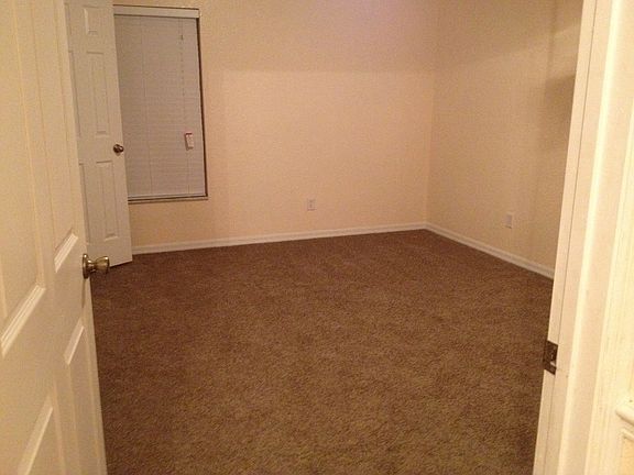 master bedroom with walk-in closet