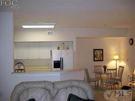 Bright and open kitchen with eat in area.