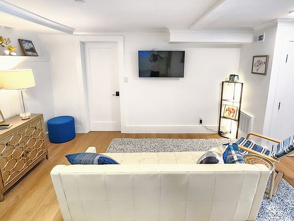 Living part of open area, looking toward front bedroom