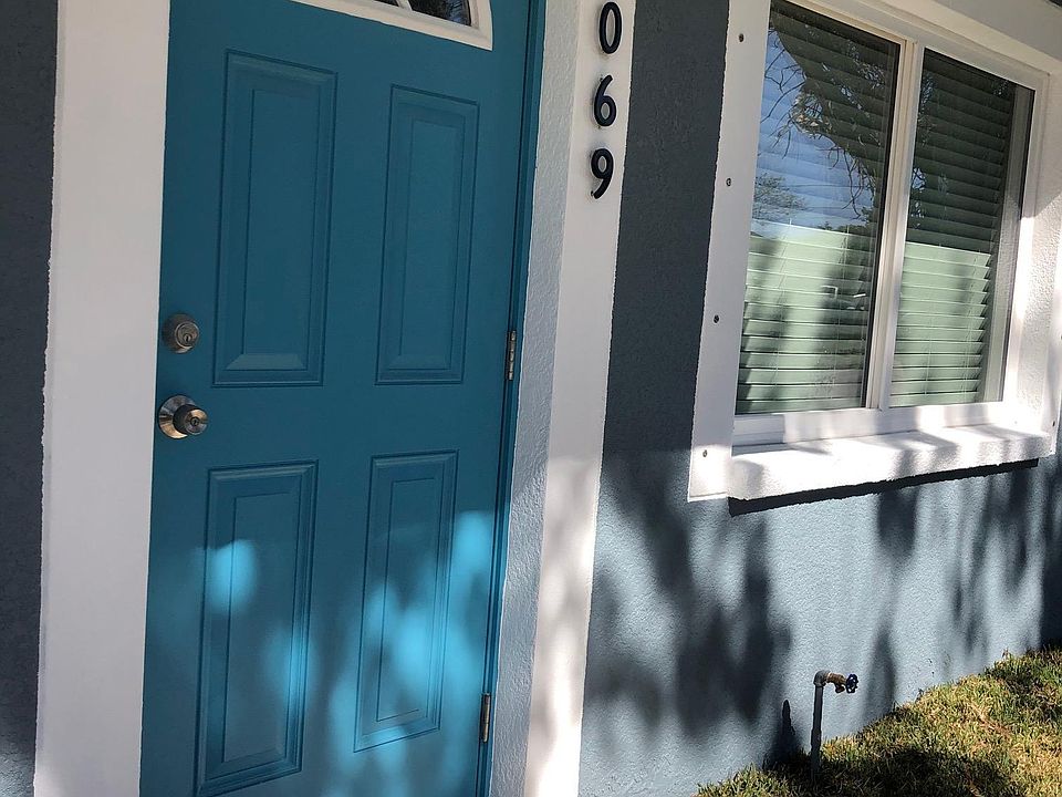 Newly painted house with paver entrance