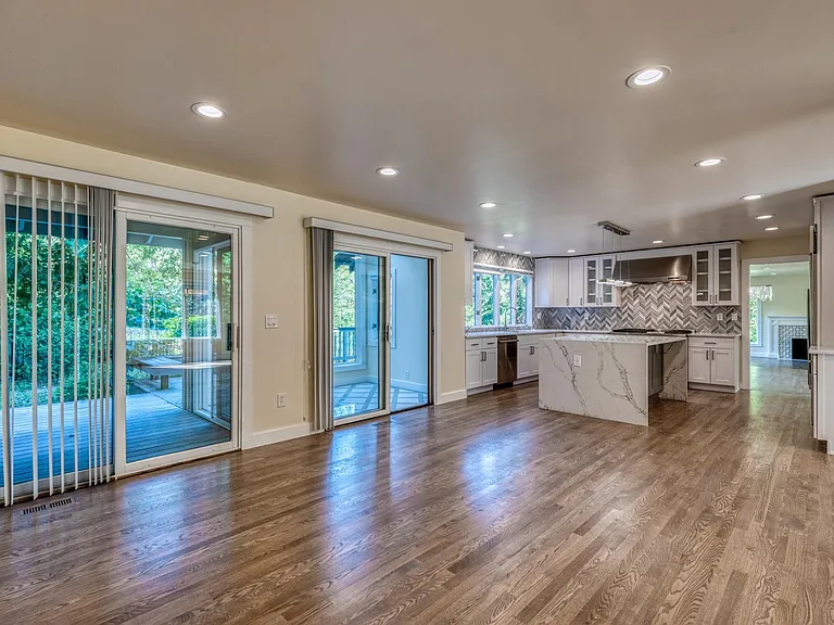 Another view of the living room and kitchen