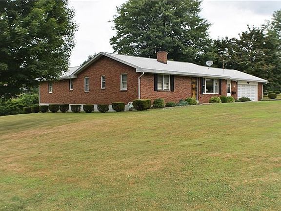 Definitely not a drive by- This side view gives you just a glimpse of the spaciousness of this sprawling ranch. You have to come