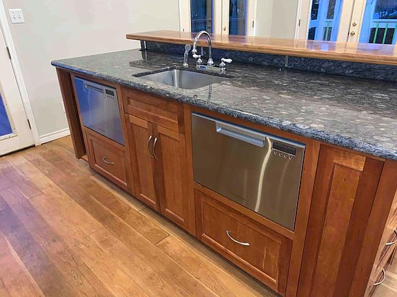 Has two dishwashers at counter height