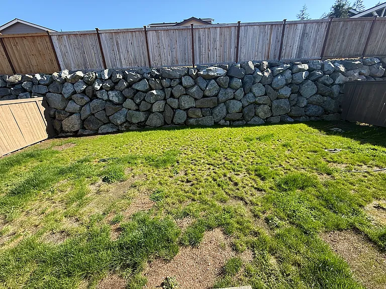 Fully fenced backyard