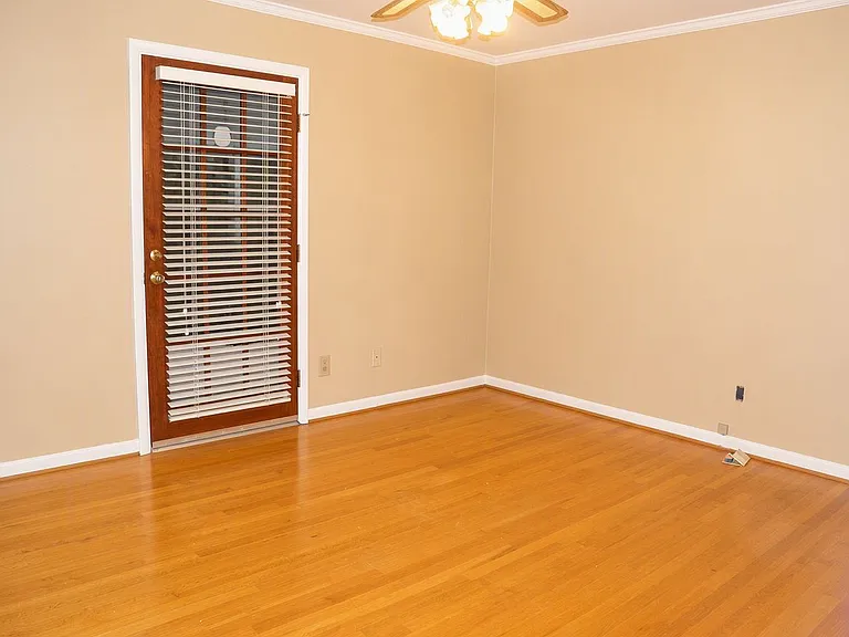 Office/bedroom connects to the upper level deck.