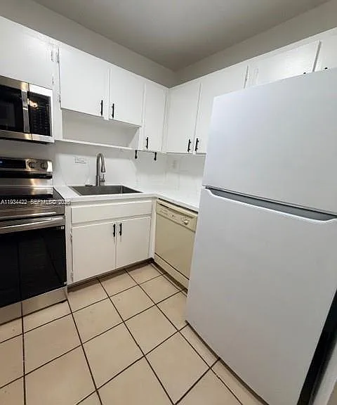 8990 SW 24th St #215 — Photo 18