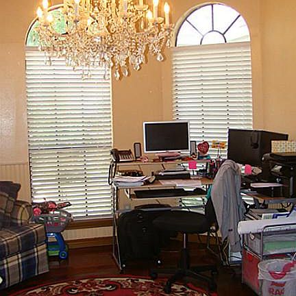 FORMAL DINING ROOM WITH WOOD FLOORS AND VAULTED CEILING