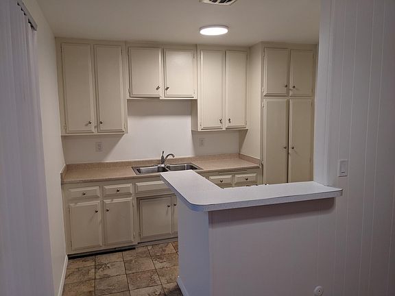 Kitchen with stove included.