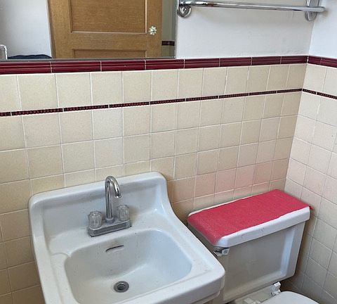 Bedroom 1 partial bathroom. Showering to be done upstairs in the full bathrooms.