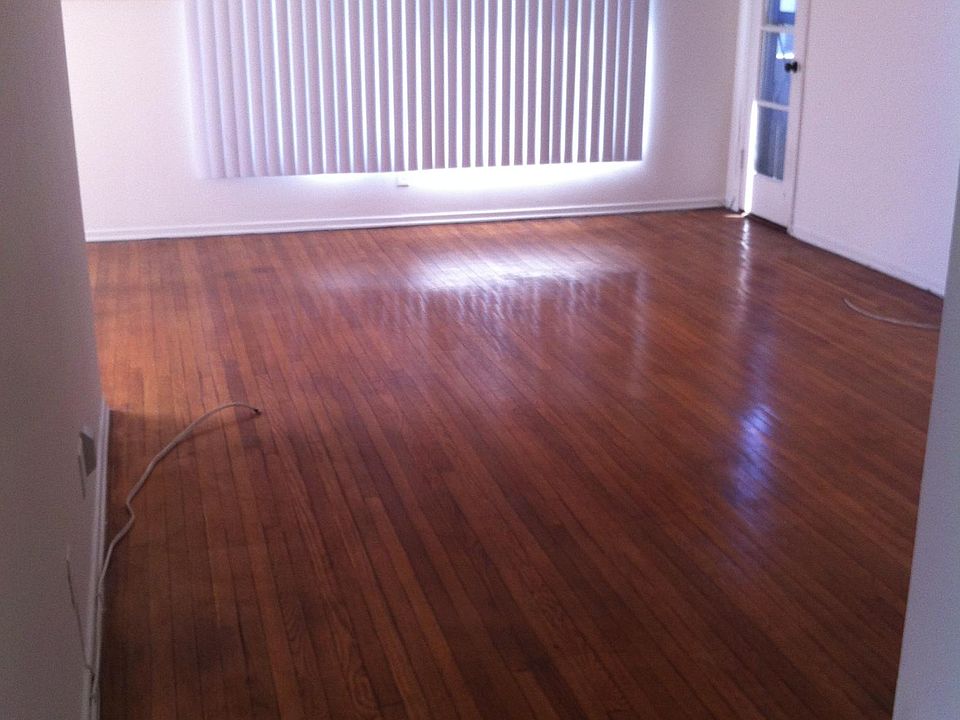 LR fm Hallway looking at main window and Balcony door