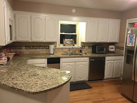 Lots of cabinets and counter