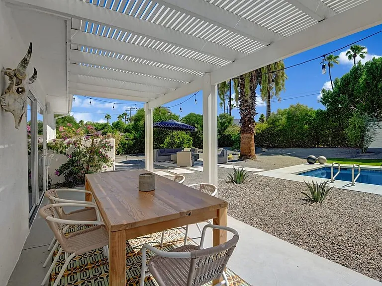 Outside dining area / reclaimed wood table