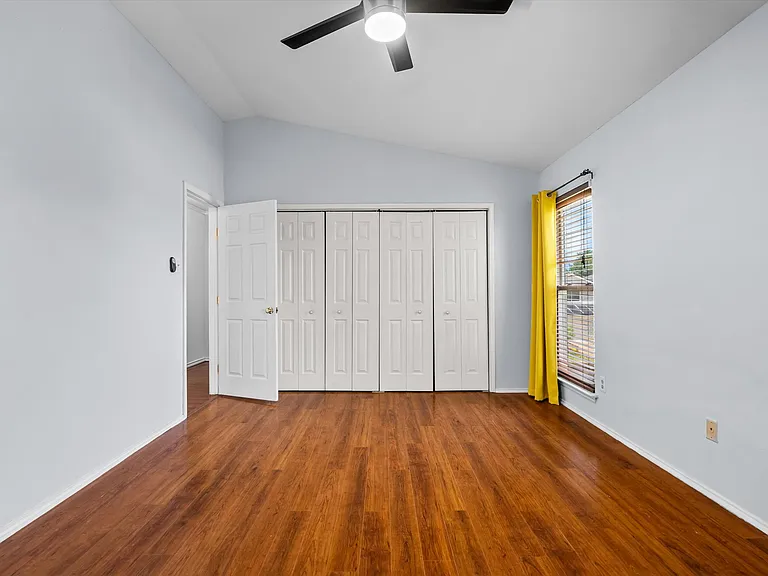 The primary bedroom has a full 11 feet of custom closet features!