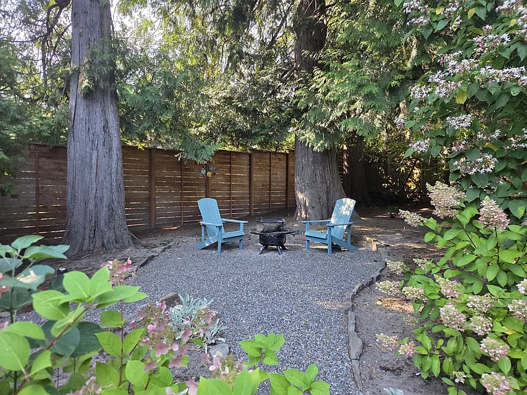 Escape to your own private firepit, nestled among the rustling trees
