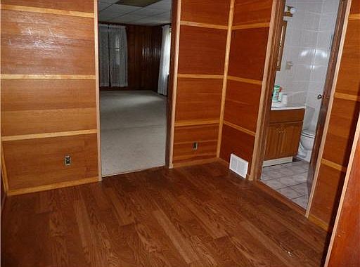 The den provides extra space for your family.