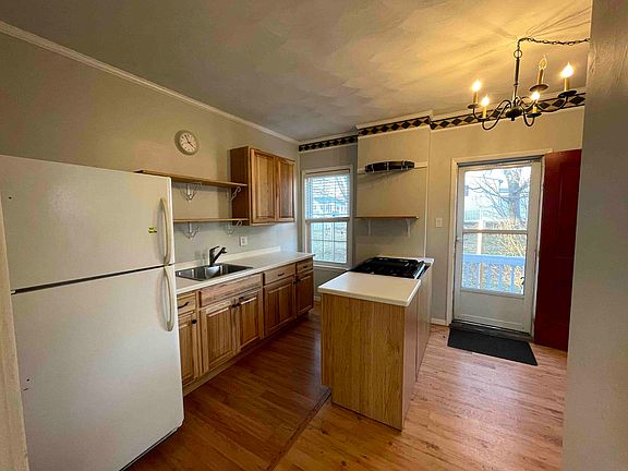 Kitchen with recently updated gas stove and oven