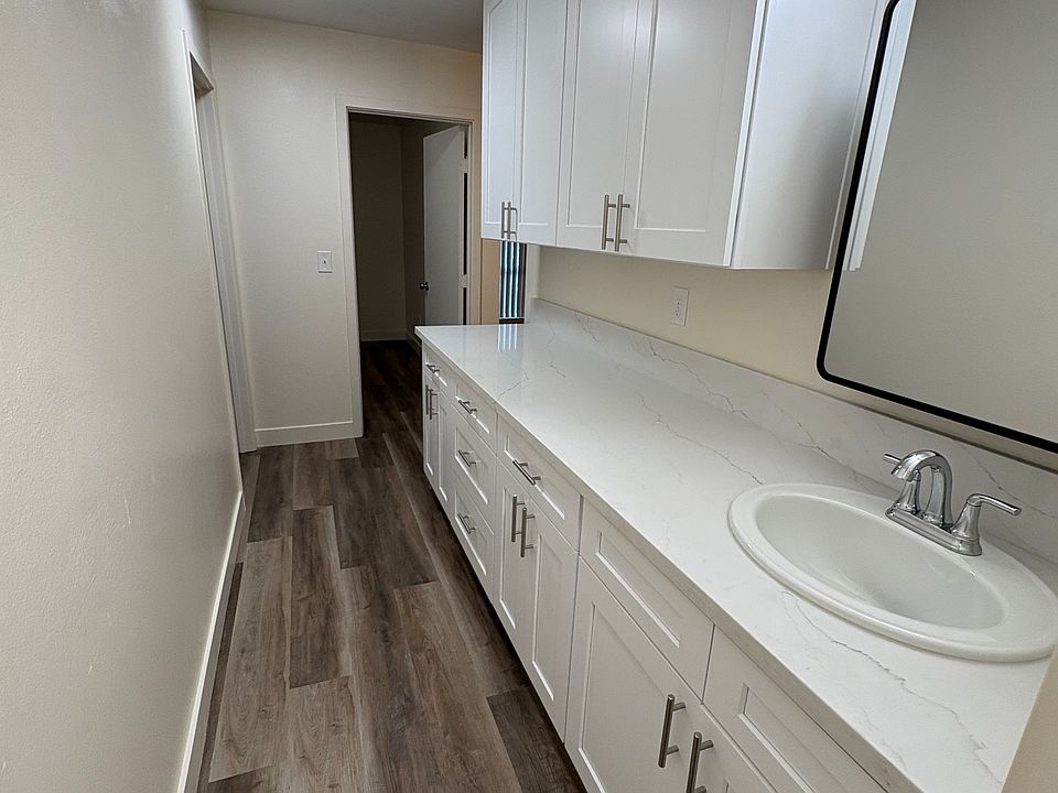 Hallway storage and bathroom sink