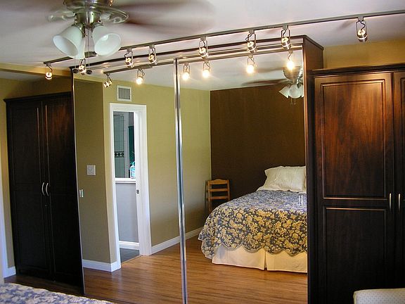 Master Bedroom Custom Closet System with Accent Lighting with Dimmers