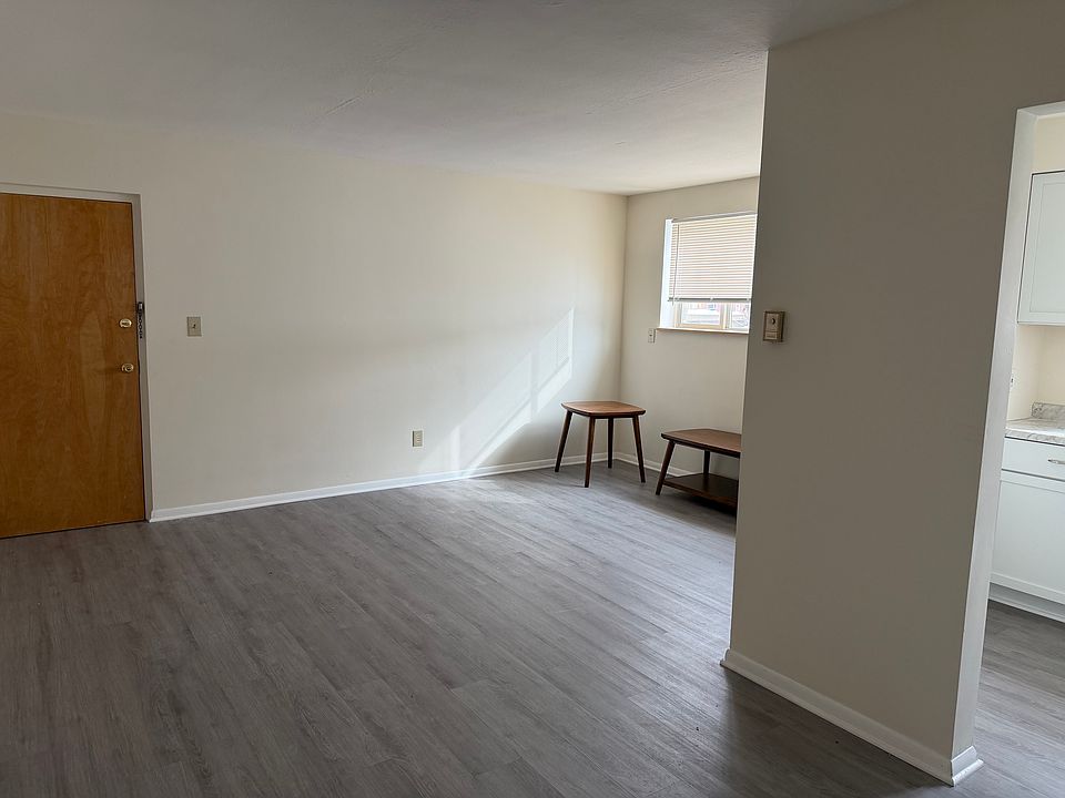Living room view with kitchen on the right side