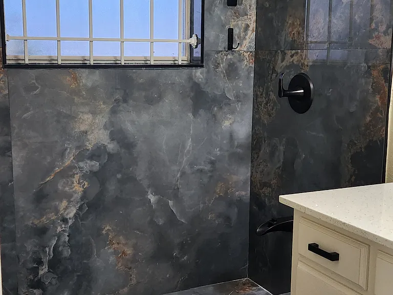 Full shower and bath, large vanity in master bath