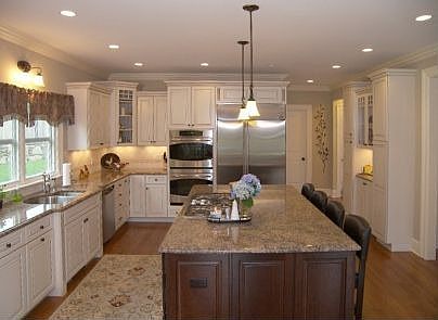 Open Kitchen with Stainless Appliances and Granite Counters