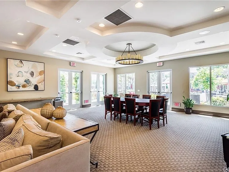 Community meeting room with conference table, reservable kitchen (w/fee), cable television