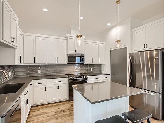 Nice kitchen area. Fridge included.