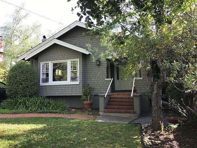 Front of Home-Charming front porch with room for a bench