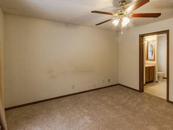 Main floor master bedroom with new carpet.