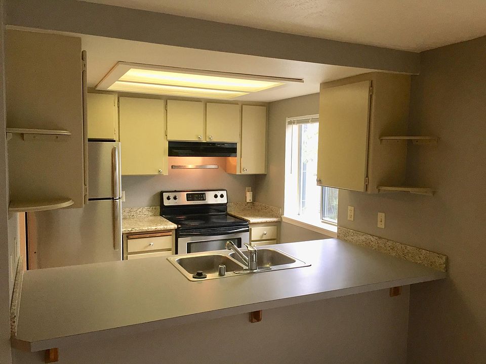 Kitchen has stainless steel appliances