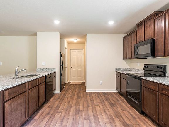 This move-in ready home features gorgeous granite countertops in the kitchen
