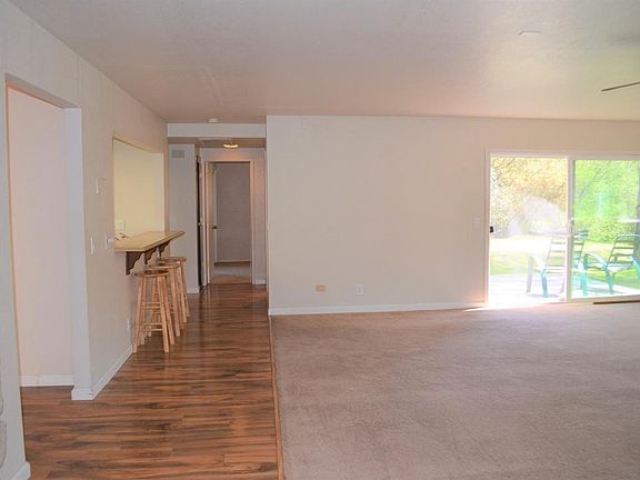 Breakfast bar looking into kitchen.
