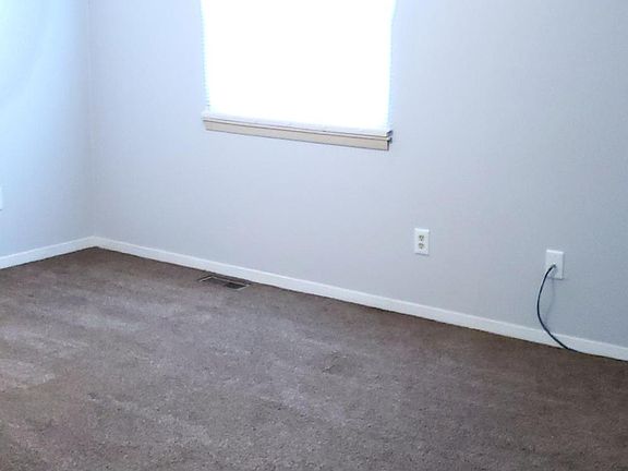 Master bedroom much larger than shown in photo, features two large closets
