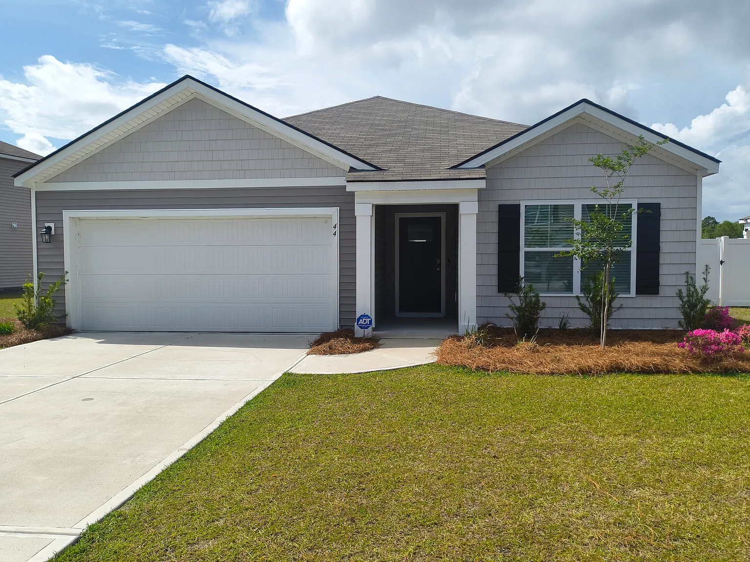 Price Improvement! Waterfront Living and Landscaping! 3 Bed / 2 Bath Home in Autumns Wood — Photo 1