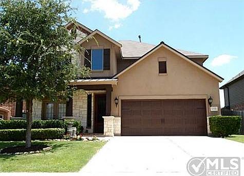 Beautiful exterior with stone & metal roof accents!