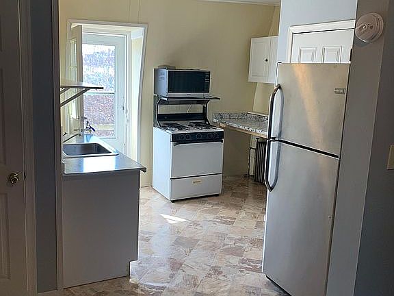 Living room looking towards back door