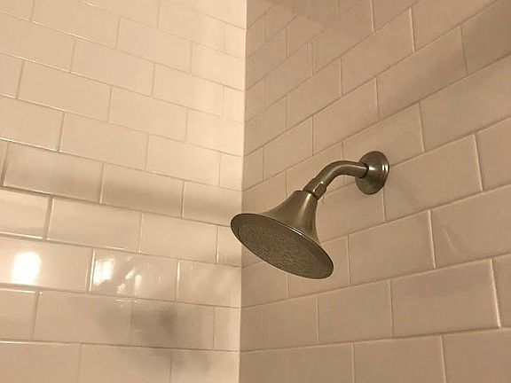 Full bathroom with bathtub and shower