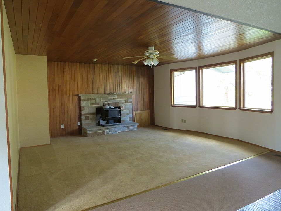 Large living room with woodstove/fireplace