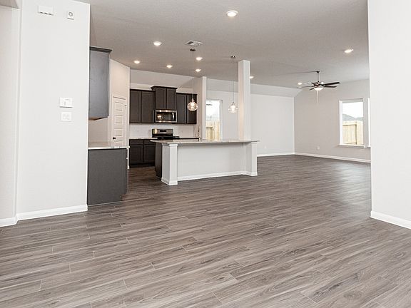 Dining Area to Kitchen and Family Room